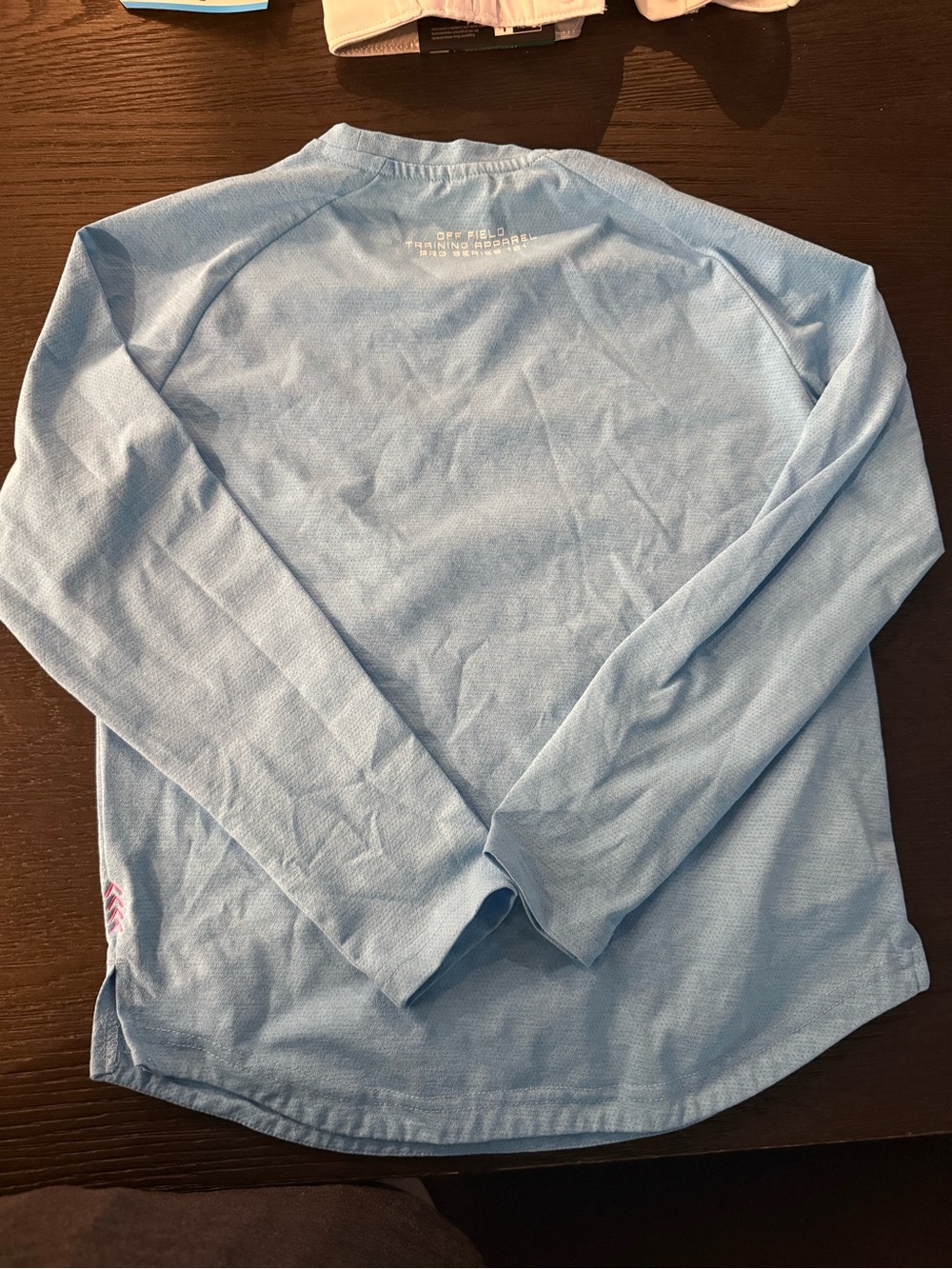 Light Blue Long-Sleeve Kids Performance Tee with Subtle Chest Logo - Picture 2 of 6